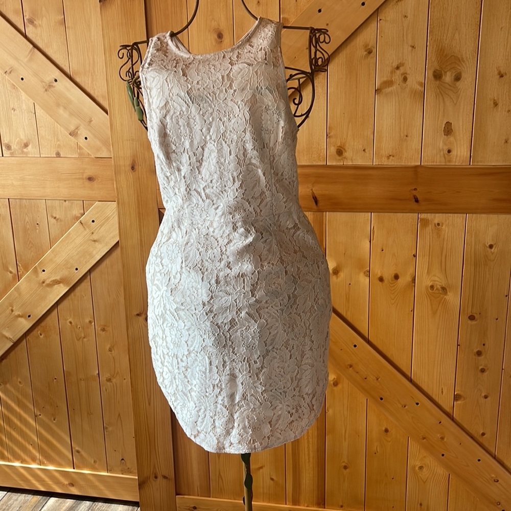 Lace, laced backed sun type dress. Lined.